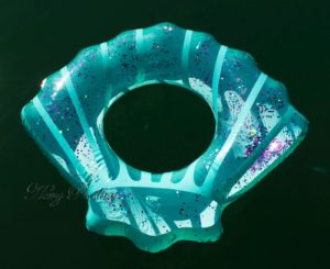 XL Schwimmreifen "Glitzermuschel" Hellblau